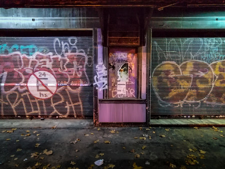 Night scene car exterior garage with graffiti, Montevideo city, Uruguayの写真素材