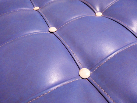 Closeup detail view blue nodern leather couchの写真素材
