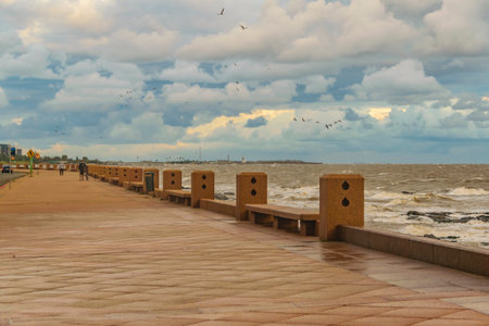 Rambla sur neighborhoo urban coastal stromy landscape scene, montevideo, uruguay