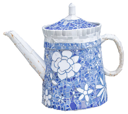Side view shot rustic ceramic decorated teapot isolated photoの写真素材