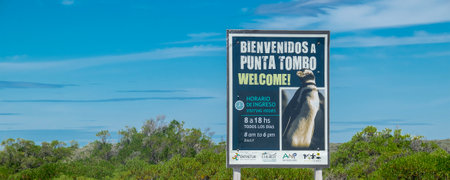 Punta Tombo, Argentina; December 28 2022: Signpost in the middle of steppe in spanish text "Welcome to punta tombo center" near punta tombo visitor center, chubut province, argentinaの写真素材