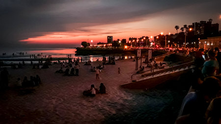 High contrast susnset scene at ramirez beach, parque rodo neighborhood, montevideo city, uruguayの写真素材