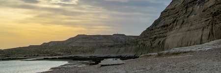 Landcape scene at empty beach, puerto piramides beach, biedma department, puerto madryn, chubut province, argentinaの写真素材