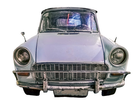 Front view shot depicting a classic style car isolated photoの写真素材