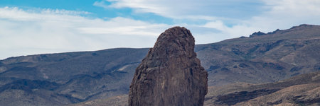 Patagonia landscape showing the famous piedra parada, a striking natural rock formation formed by ancient volcanic activity located in patagonia, chubut province, argentinaの写真素材