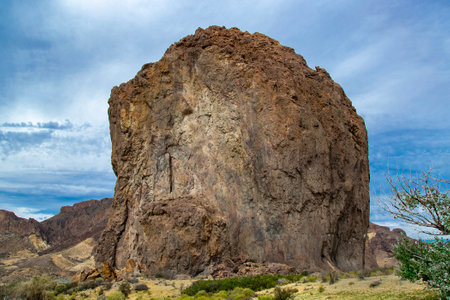 Patagonia landscape showing the famous piedra parada, a striking natural rock formation formed by ancient volcanic activity located in patagonia, chubut province, argentinaの写真素材