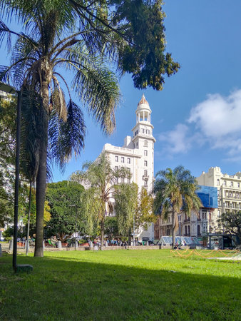 Sunny autumn day urban scene at juan pedro fabini square, located in the center of montevideo city, uruguayの写真素材
