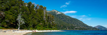 Sunny summer day landscape at one of the beaches of bariloche, nahuel huapi national park, rio negro province, argentina.の写真素材