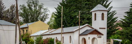 Exterior view of rustic white old church at small village located in rio negro province, patagonia, argentinaの写真素材