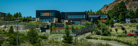 Contemporary style big houses in the middle of steppe Patagonian landscape, rio negro province, patagonia, argentinaの写真素材