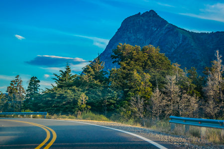 Empty modern highway crossing landscape, rio negro province, patagonia, argentinaの写真素材