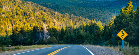 Empty modern highway crossing patagonian landscape, patagonia, argentinaの写真素材