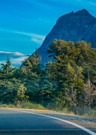 Empty modern highway crossing patagonian landscape, patagonia, argentinaの写真素材