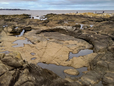 Landscape day scne at rocky small islet called "isla del mono" located in buceo neighborhood, montevideo city, uruguayの写真素材