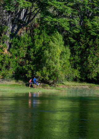 Quiet lake and forest at background landscape at los alerces national park, a world heritage site located in chubut province, patagonia, argentinaの写真素材