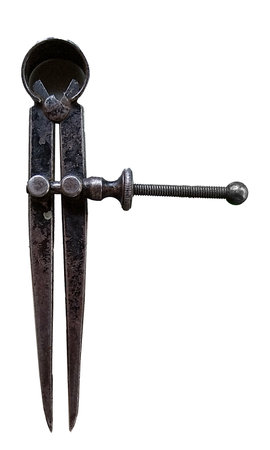 Photograph of an antique instrument set against a clean white backgroundの写真素材