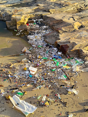Aerial view of a rocky beach covered in litter, ciudad vieja, montevideo, uruguayの写真素材