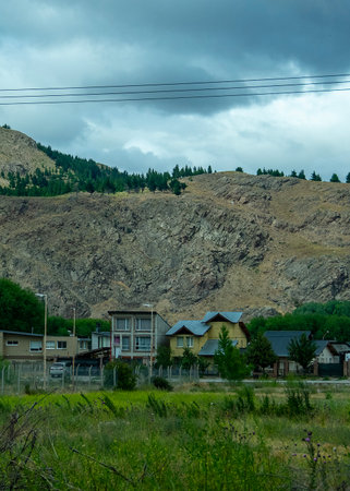Small village and mountains at background, cushamen department, chubut province, argentinaの写真素材