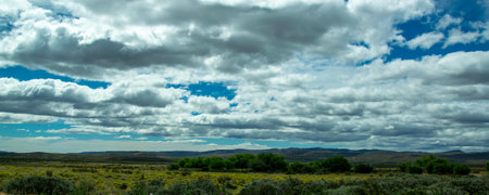 Steppe patagonia landscape and mountains range at background, cushamen department, chubut province, argentinaの写真素材