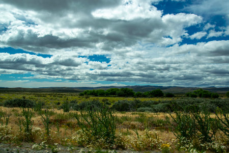Steppe patagonia landscape and mountains range at background, cushamen department, chubut province, argentinaの写真素材