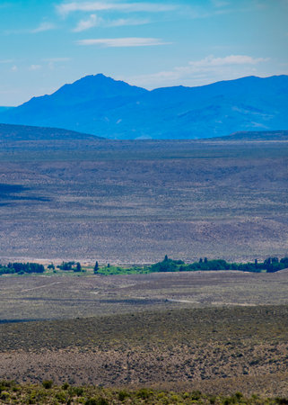 Steppe patagonia landscape and mountains range at background, cushamen department, chubut province, argentinaの写真素材