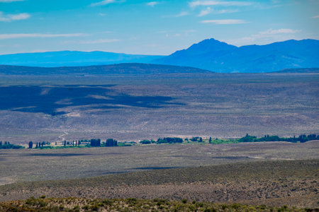 Steppe patagonia landscape and mountains range at background, cushamen department, chubut province, argentinaの写真素材