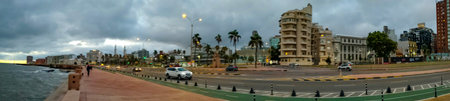 Panoramic urban shot of avenue and buildings at ciudad vieja neighborhood, montevideo city, uruguayの写真素材