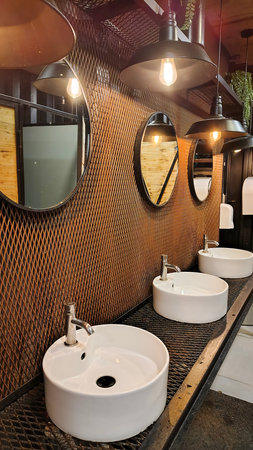 Medium shot perspective view of a contemporary style restauratn bathroom roomの写真素材