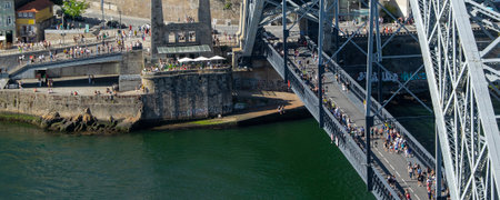 Porto, Portugal: August 12 2023: A high-angle shot focusing on the magnificent Dom Luis I Bridge, an...