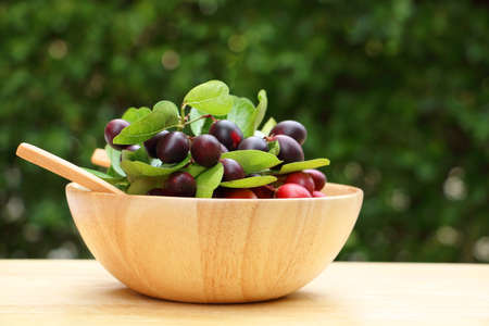 koronda fruits in wooden bowlの写真素材