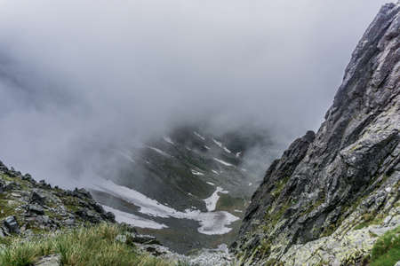 Great view of the foggy Tatra Mountains. Tatra National Park. Poland, Europe. Dramatic scene. Beauty...