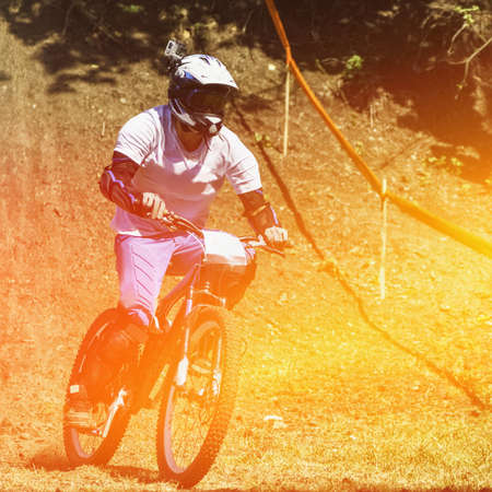 Mountain bike cyclist doing downhill extreme biking