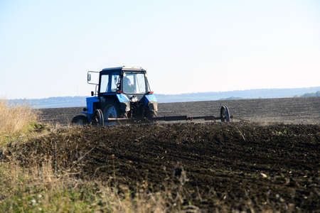 Tractor plowingの写真素材