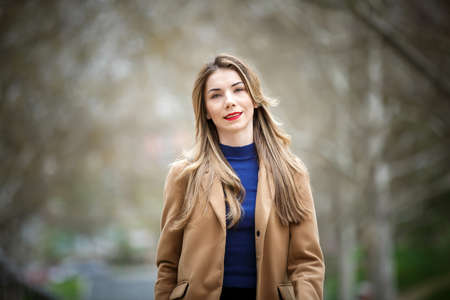 Young beautiful business woman, outdoors portraitの写真素材