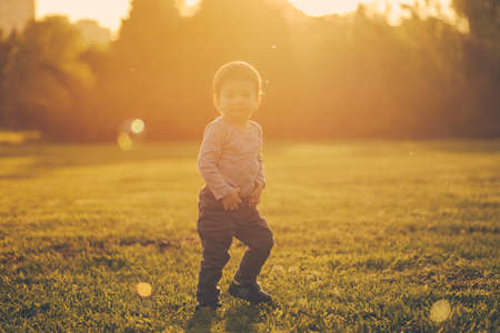 Mom and son have fun and make balloons from soapの写真素材