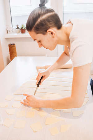 Ravioli homemade. Fresh dough and ravioli traditional to the rustic table.