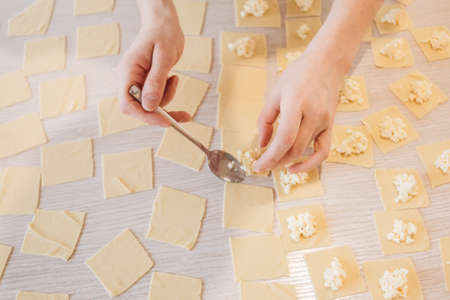 Ravioli homemade. Fresh dough and ravioli traditional to the rustic table.
