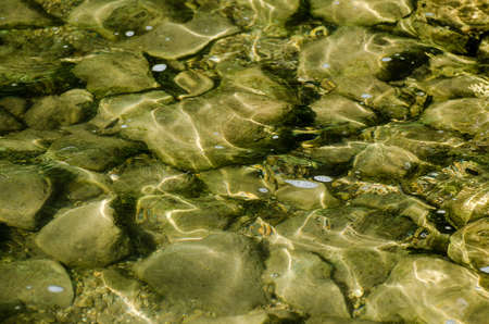 Rocky lake bottom and clear water at Child's Lake, Duck Mountain Provincial Park, Manitoba, Canadaの写真素材