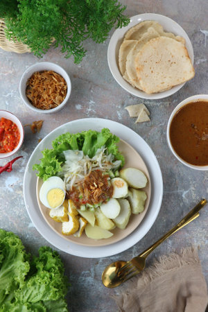 Indonesian rice vermicelli noodle soup in a bowlの写真素材