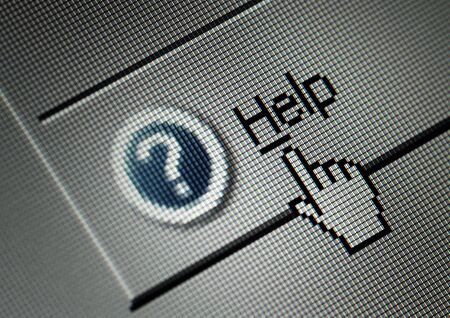 Close-up of a interface computer help button and a hand cursorの写真素材