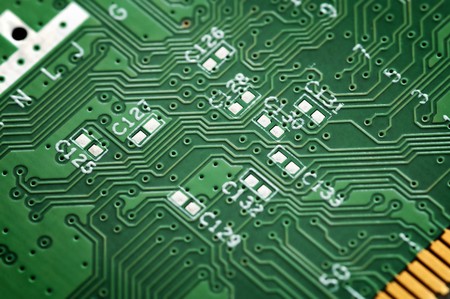 Close up of s green circuit board without components.の写真素材
