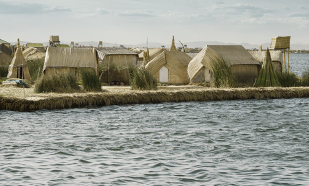 Houses on the Uros Floating Islands made of tortora rushes. October 17, 2012 - Lake Titicaca, Peruのeditorial素材