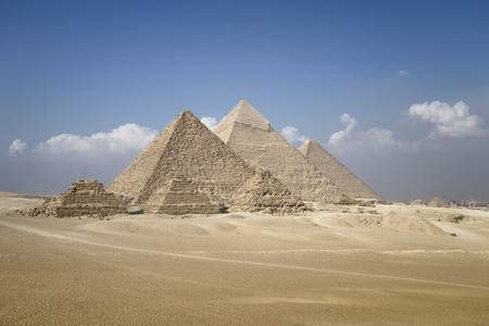 Panoramic view of pyramids from the Giza Plateau (three pyramids known as Queens' Pyramids on front...