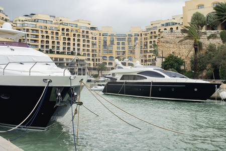 Super yachts moored at Portomaso Marina in St. Julian, Maltaの写真素材
