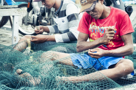 Craftsmen Making Fish Nets. January 17, 2014 - Probolinggo, East java, Indonesia