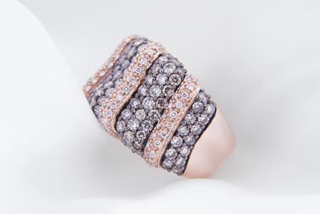 Rose Gold Ring With Diamonds On Soft White Backgroundの写真素材
