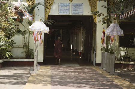 Monks Entering Kalaywa Tawya Monastery in Yangon. February 23, 2014 - Yangon, Myanmarのeditorial素材