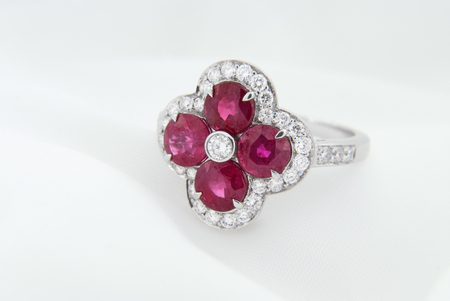 White Gold Ring With Rubies And Diamonds On Soft White Backgroundの写真素材