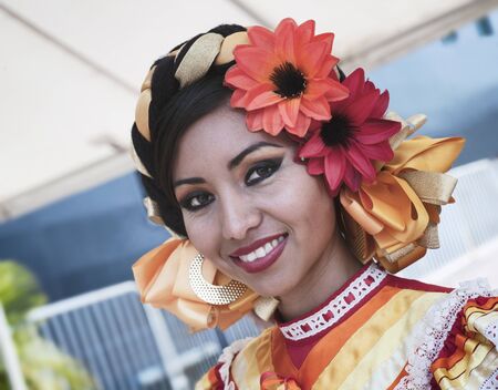 Puerto Vallarta, Mexico - April 30, 2011: Young Girl Dressed In Bright Colorful Traditional Clothingのeditorial素材
