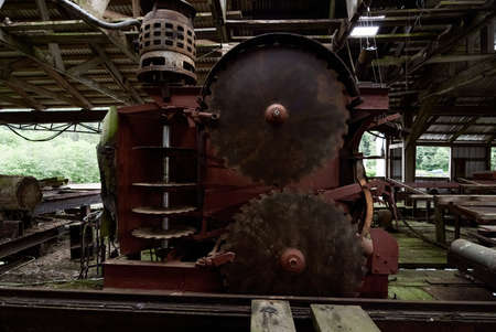 Close Up Of A Large Circular Saw Inside An Abandoned Factory For Wood Processingの写真素材